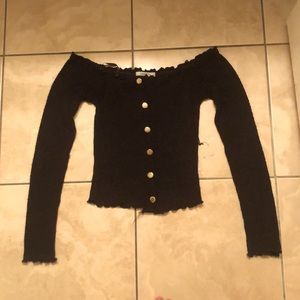 Adorable black sleek off the shoulder top.